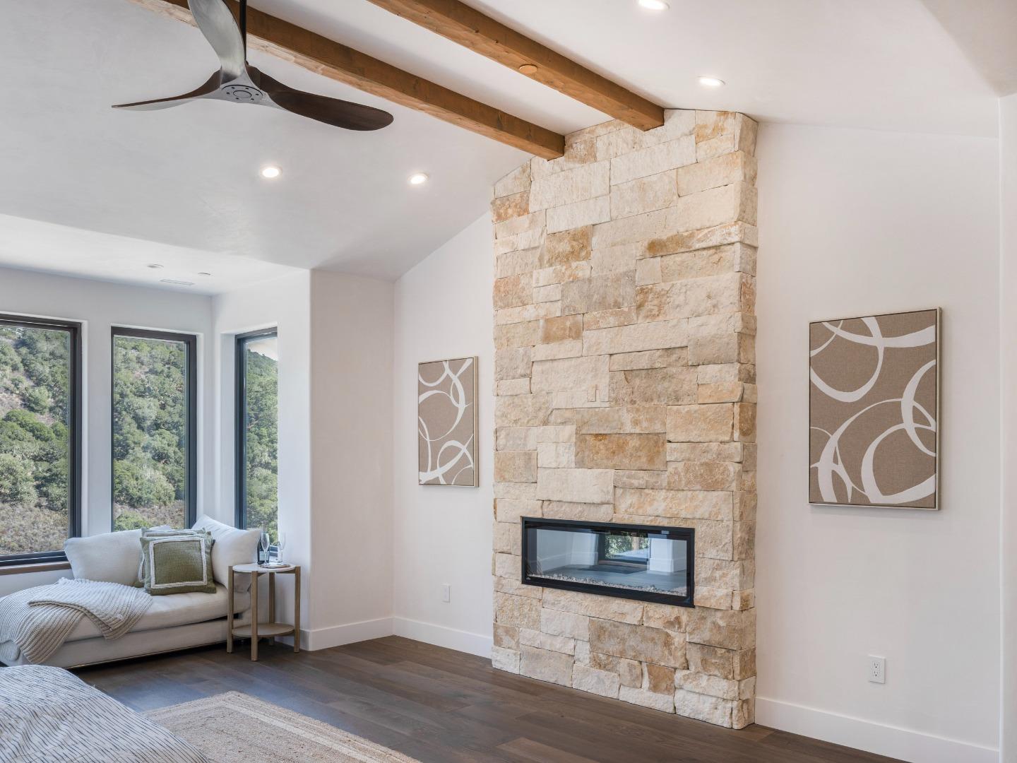 8380 Monterra Views Monterey, CA 93940 - Photo 16 of 45 a living room with furniture and a fireplace