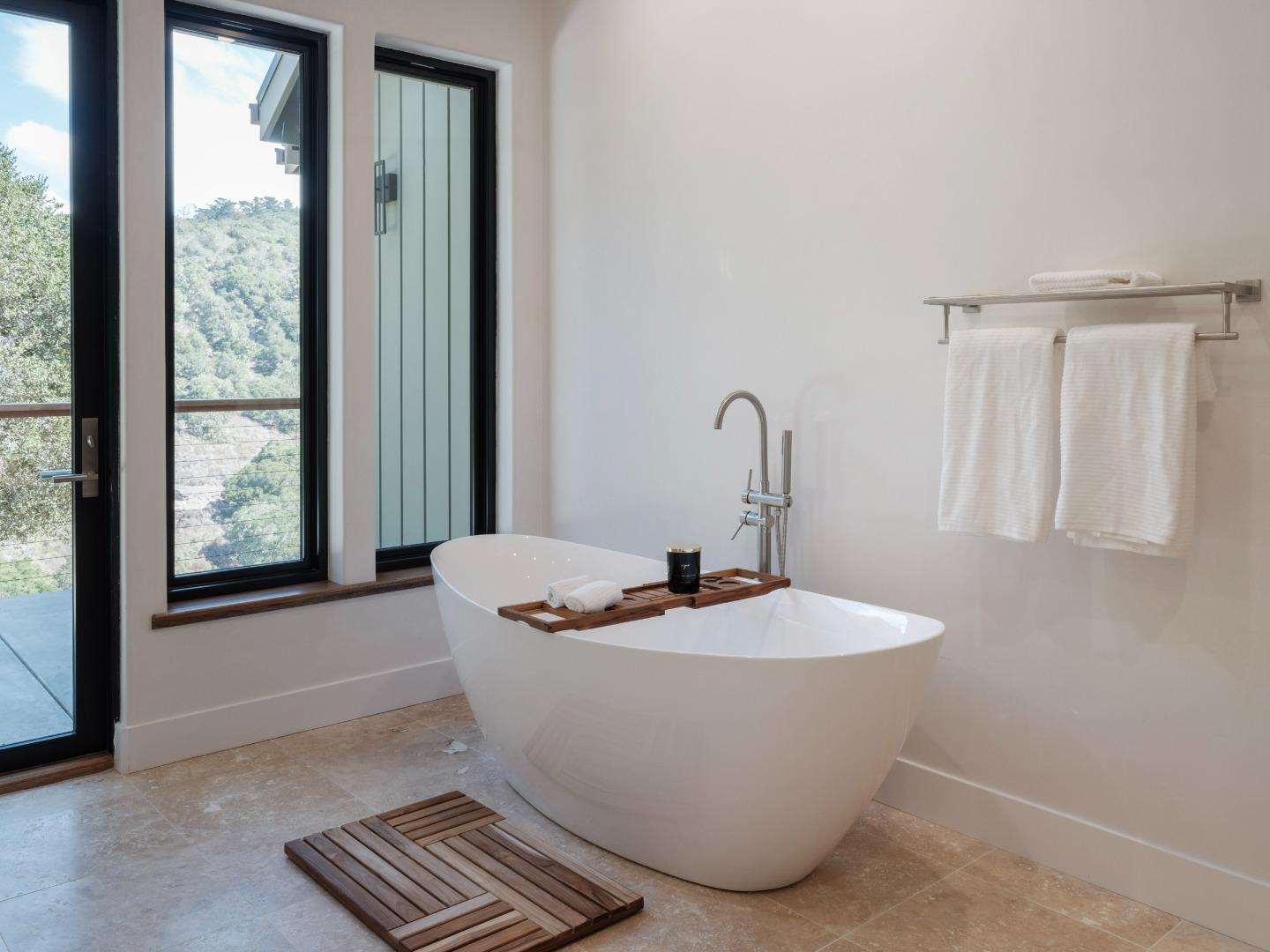 8380 Monterra Views Monterey, CA 93940 - Photo 20 of 45 a white bath tub sitting in a bathroom next to a window