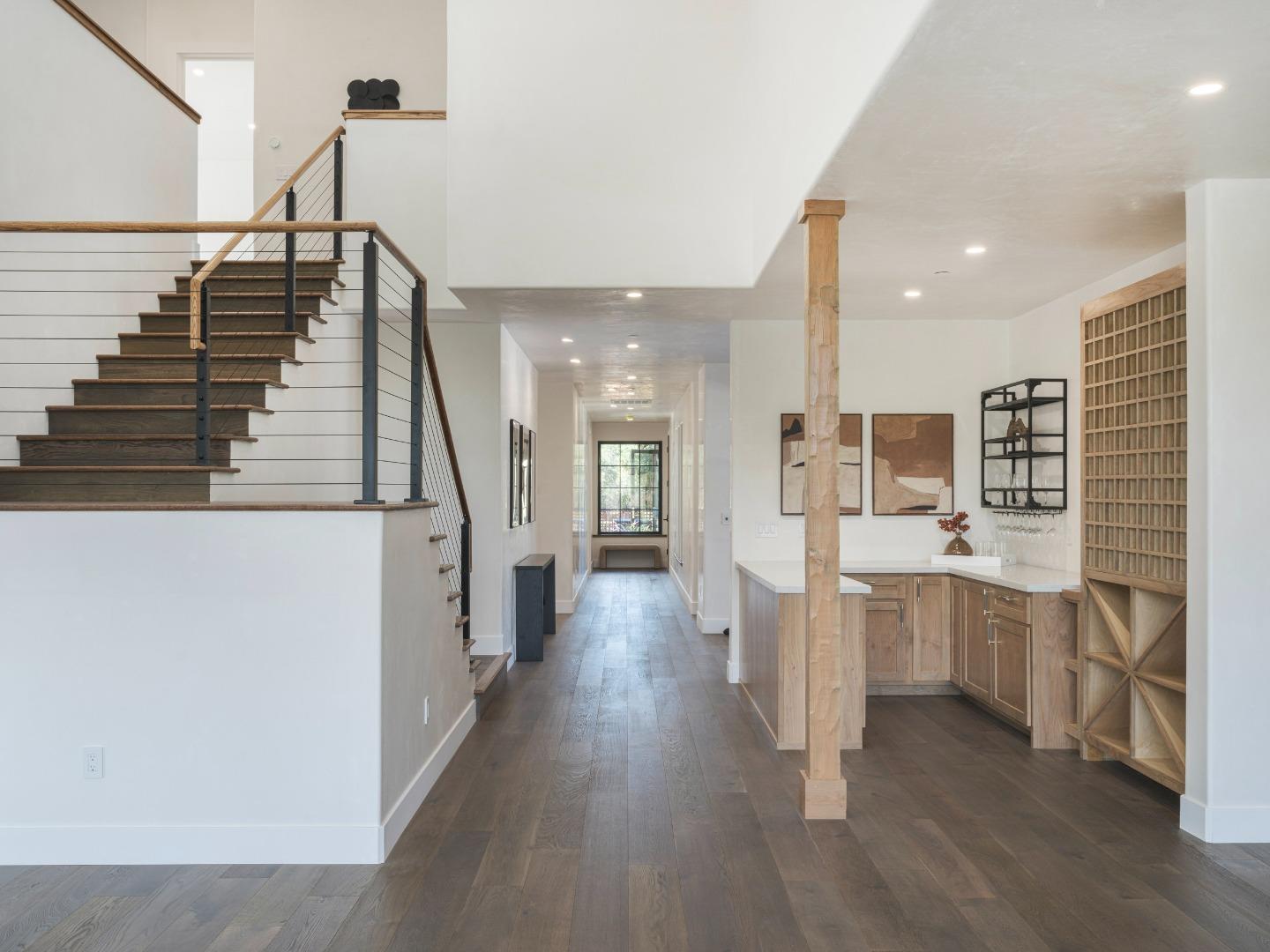 8380 Monterra Views Monterey, CA 93940 - Photo 22 of 45 a view of a kitchen with wooden floor and stairs