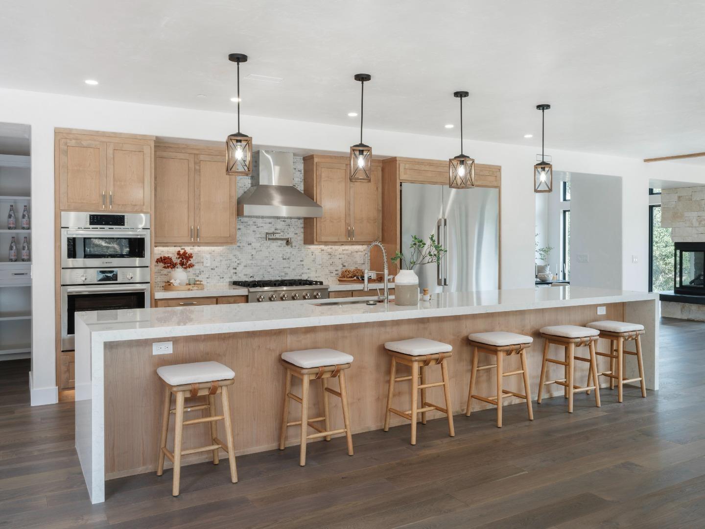 8380 Monterra Views Monterey, CA 93940 - Photo 5 of 45 a large kitchen with a table and chairs