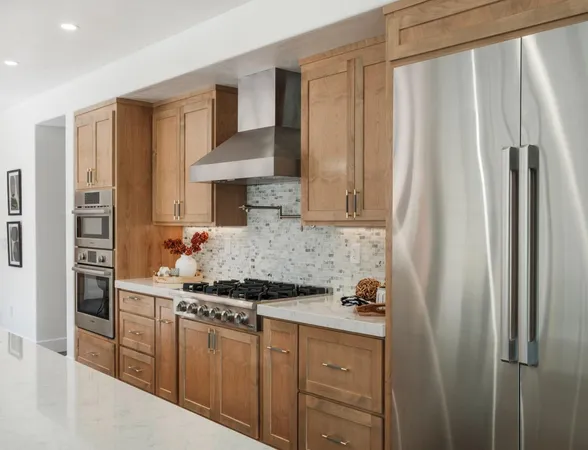 a large kitchen with a table and chairs