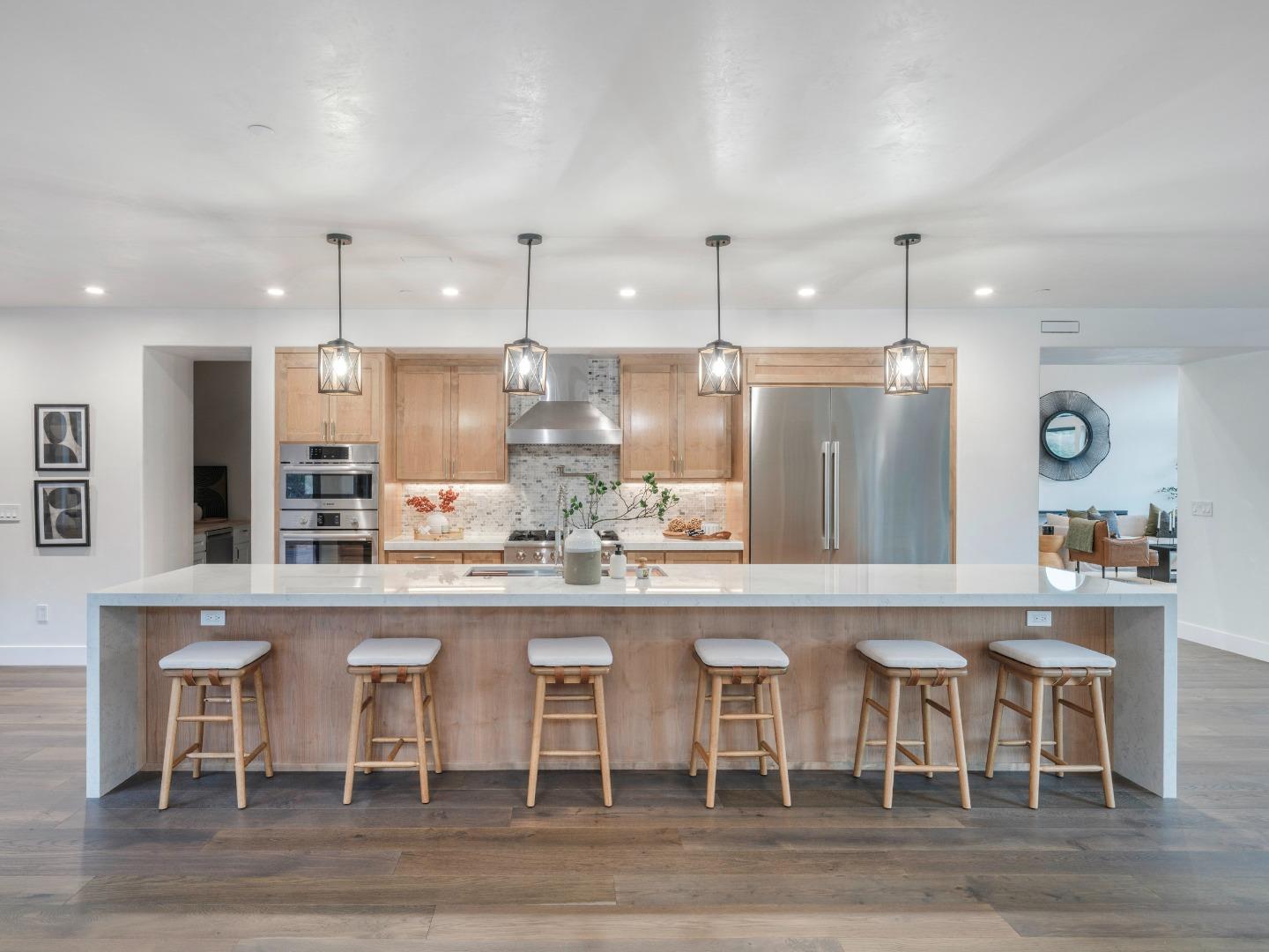 8380 Monterra Views Monterey, CA 93940 - Photo 8 of 45 a large kitchen with a table and chairs