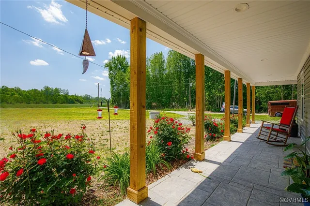 a view of a patio with a garden and patio