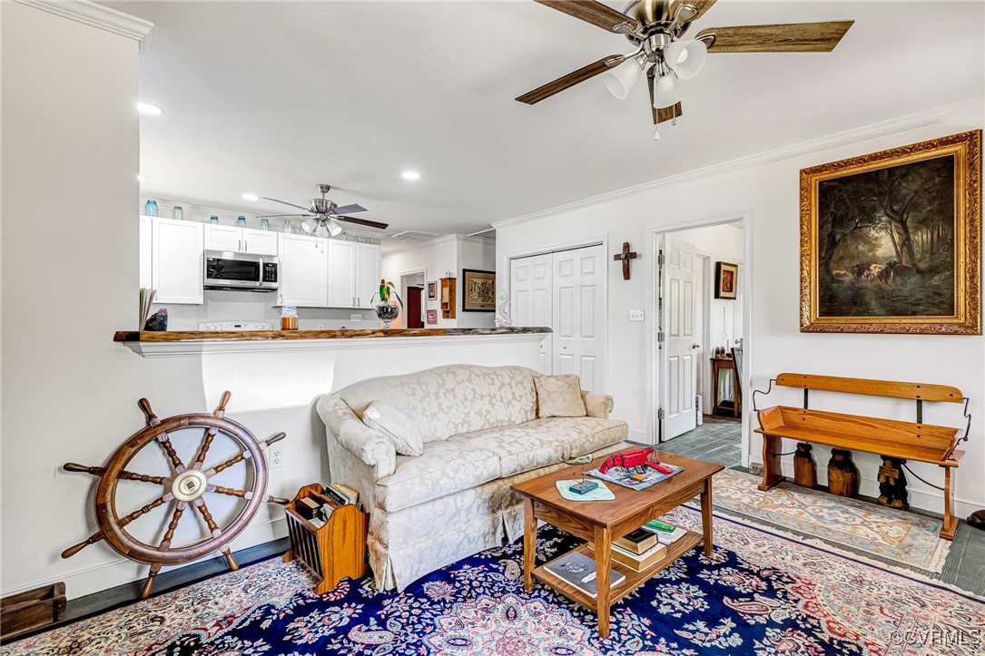 274 Regina Road Lancaster, VA 22503 - Photo 7 of 26 a living room with furniture and kitchen view