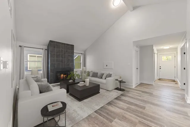 a living room with a fireplace