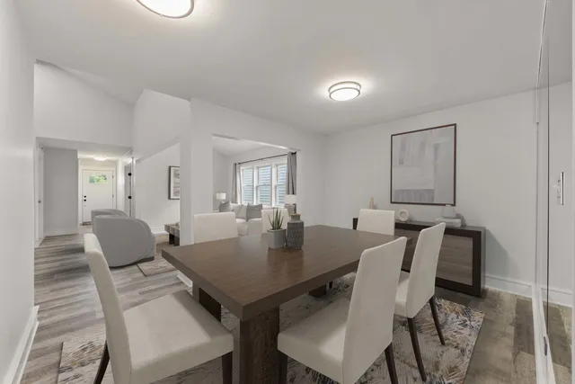 a kitchen with a stove a sink and a refrigerator