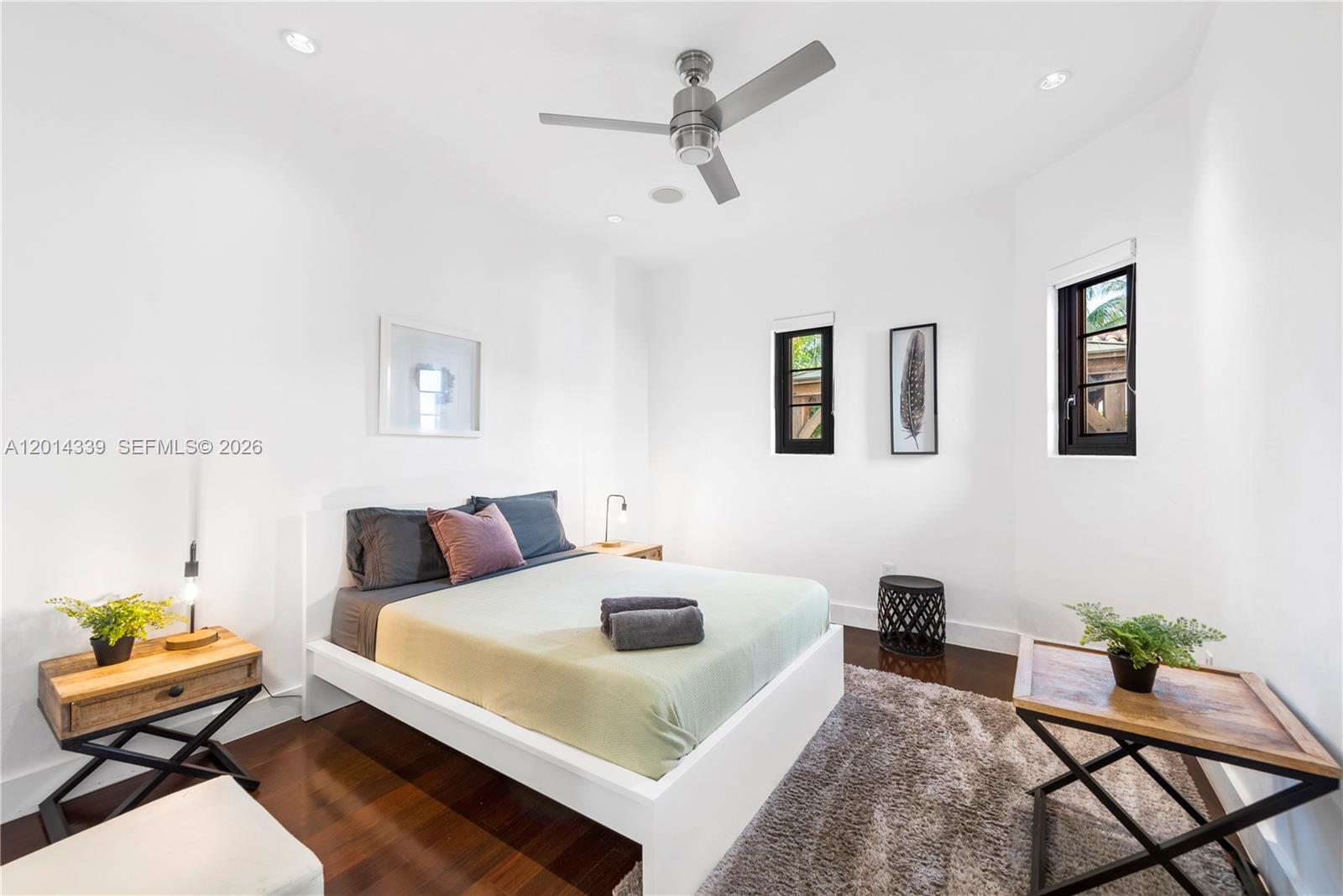 1201 Northeast 83rd Street Miami, FL 33138 - Photo 22 of 42 a living room with furniture and a table