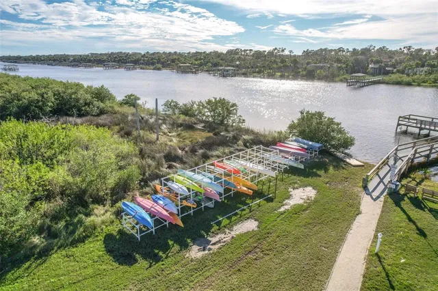 an aerial view of a house with a garden