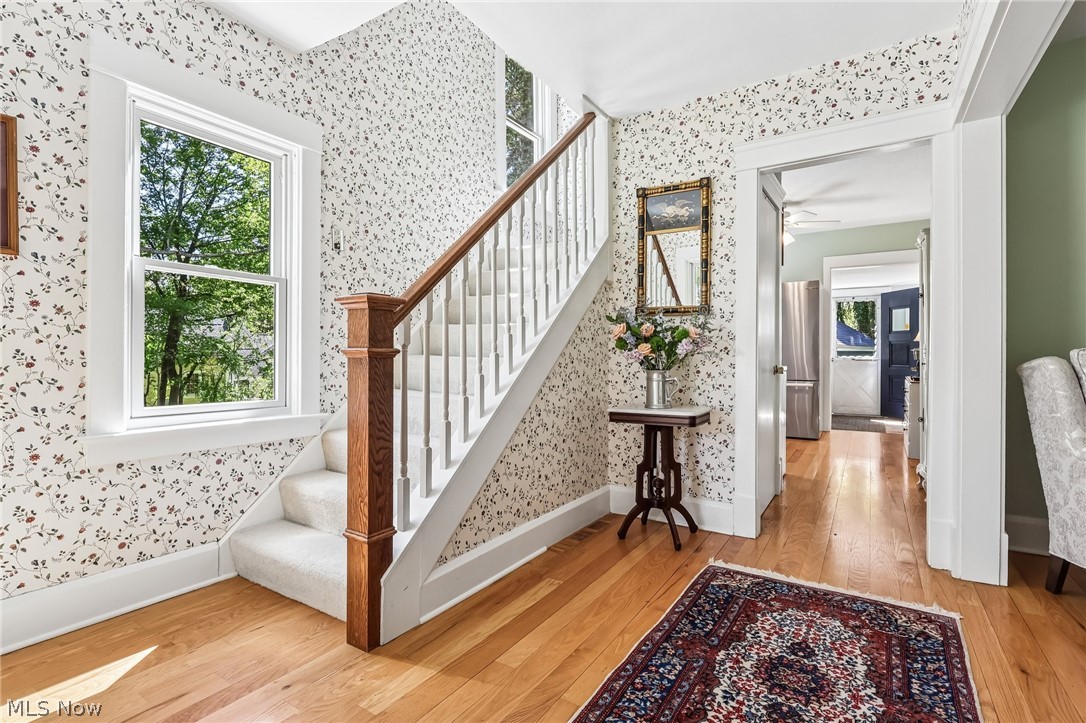 Foyer with hardwood floors