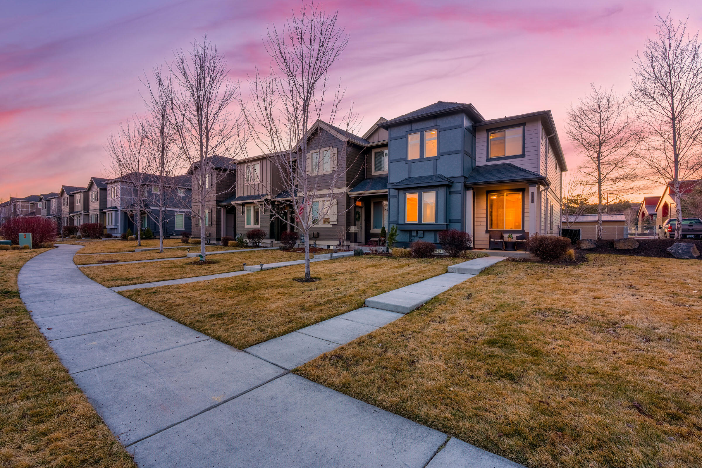 3365 Southwest 28th Street Redmond, OR 97756 - Photo 2 of 39 a front view of residential houses with yard