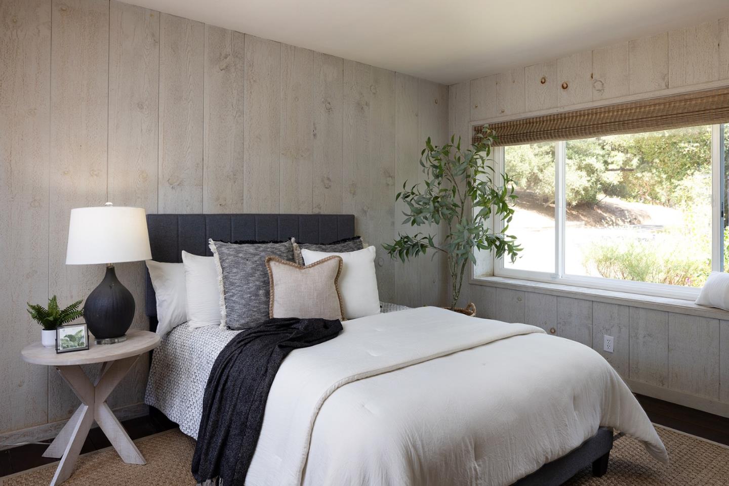 5165 Carmel Valley Road Carmel, CA 93923 - Photo 15 of 19 a bedroom with a bed and a window