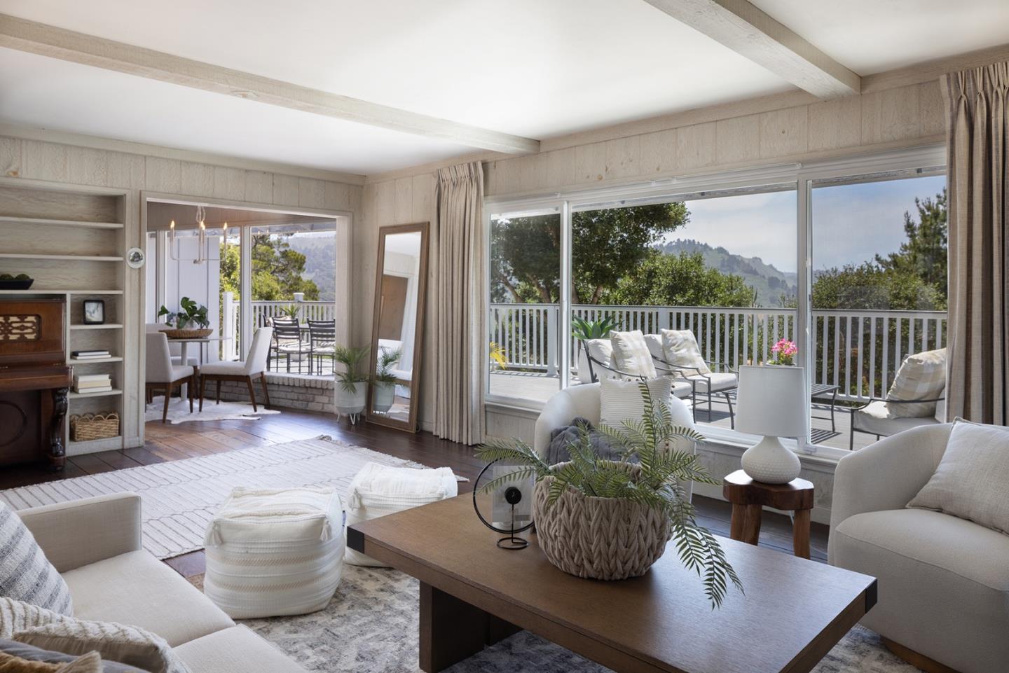 5165 Carmel Valley Road Carmel, CA 93923 - Photo 2 of 19 a living room with furniture and a large window