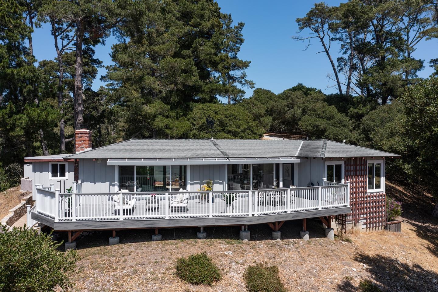 5165 Carmel Valley Road Carmel, CA 93923 - Photo 3 of 19 a front view of a house with a boat