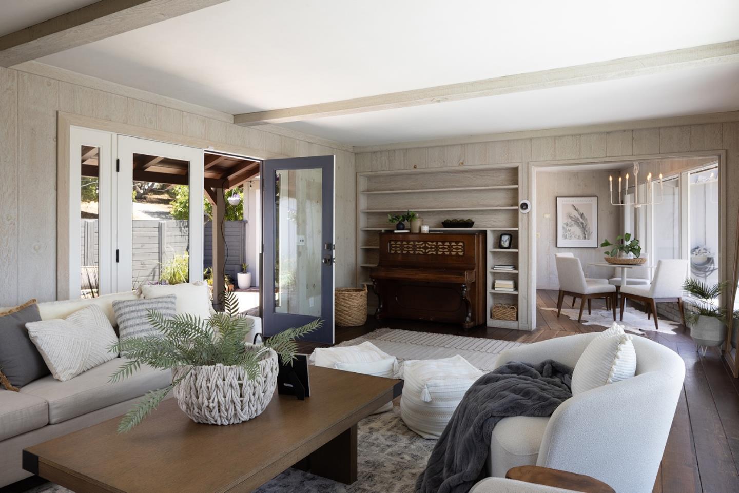 5165 Carmel Valley Road Carmel, CA 93923 - Photo 7 of 19 a living room with furniture fireplace and a window