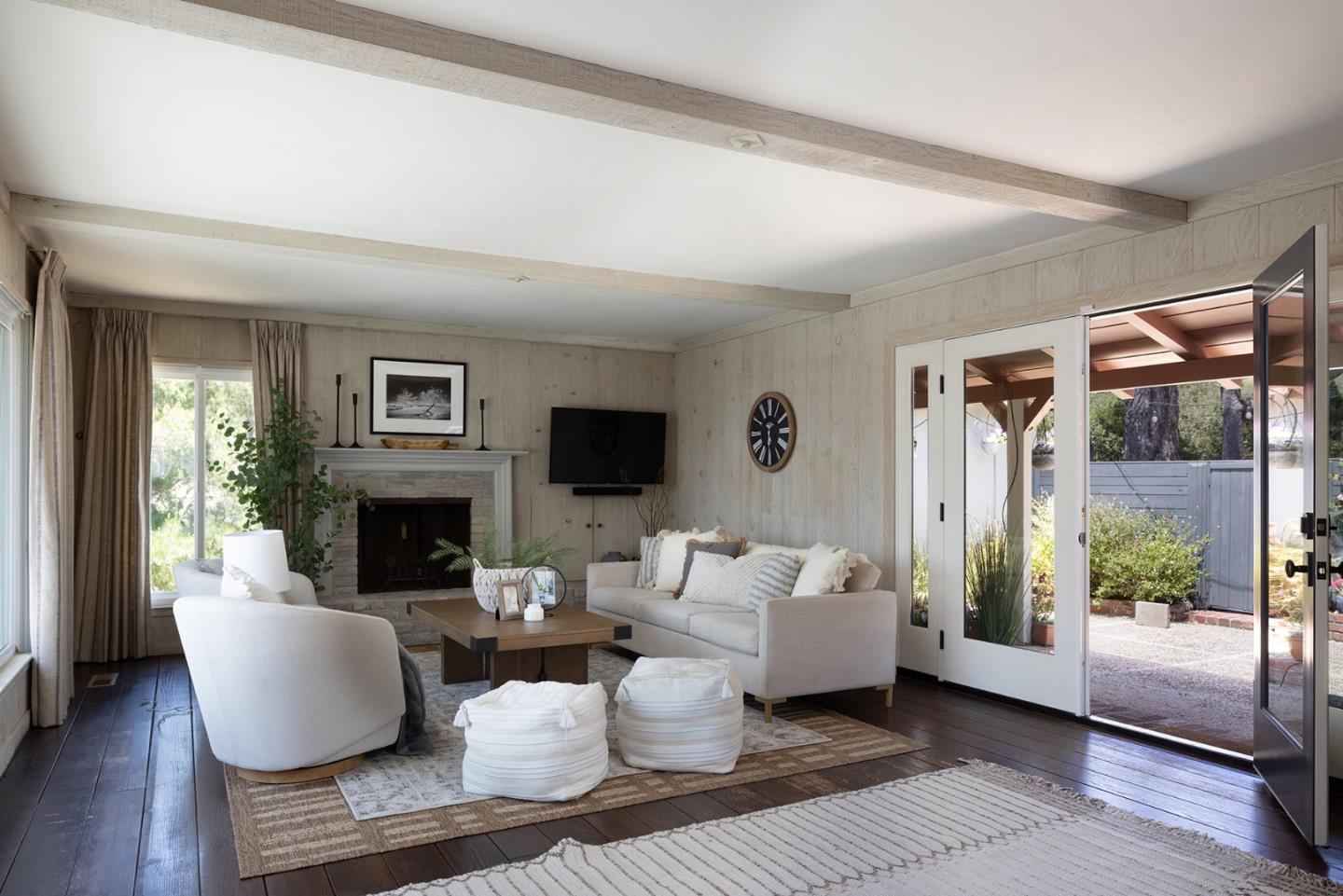 5165 Carmel Valley Road Carmel, CA 93923 - Photo 8 of 19 a living room with furniture and a fireplace