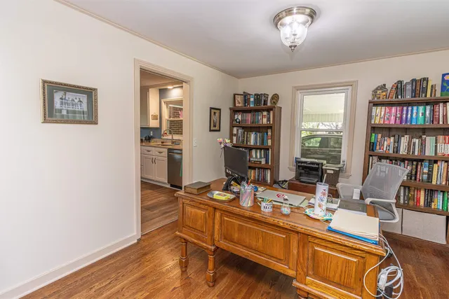 a room with furniture and a book shelf