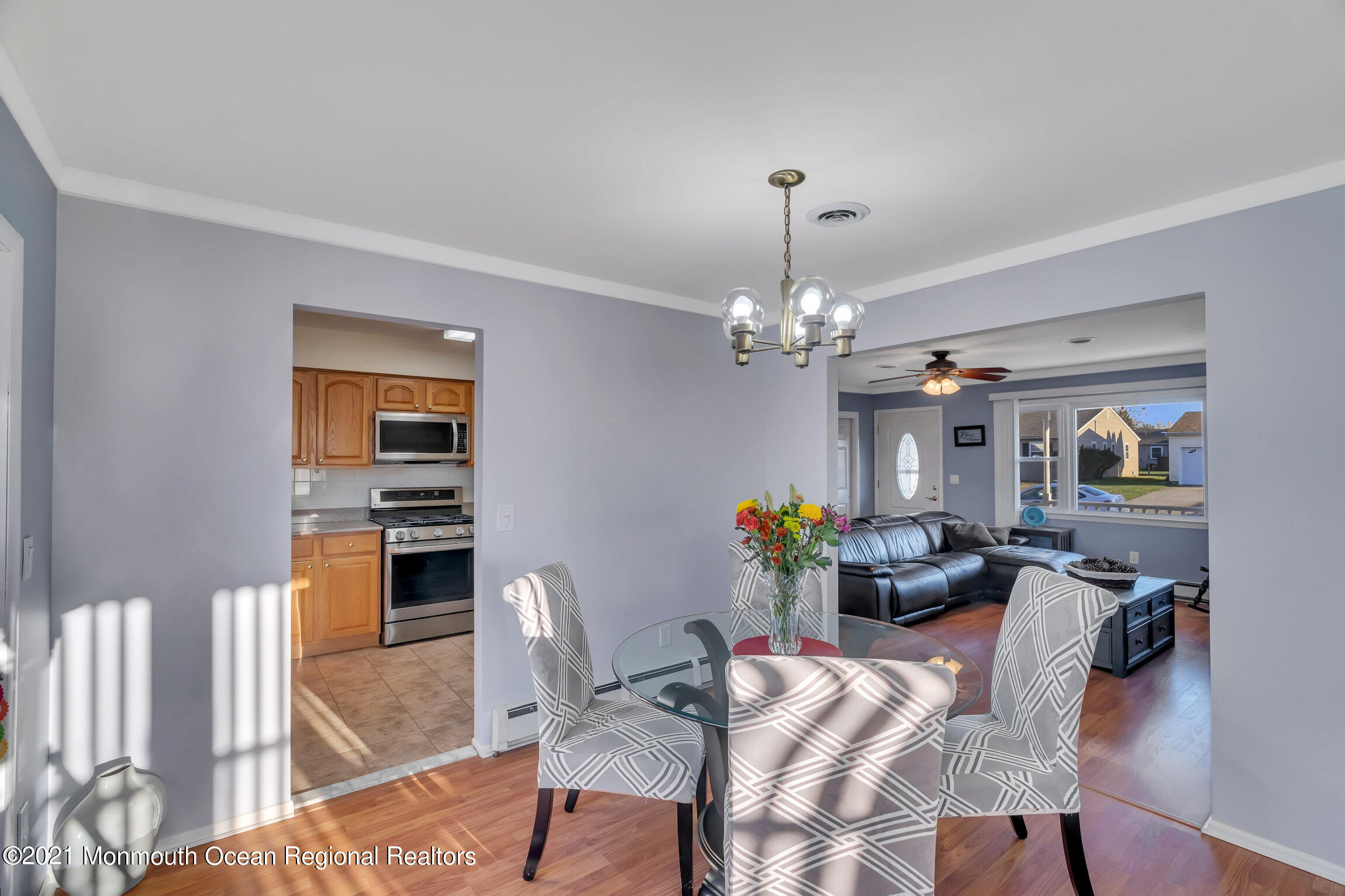 2 Coventry Road Toms River, NJ 08757 - Photo 13 of 25 a view of a dining room with furniture and chandelier