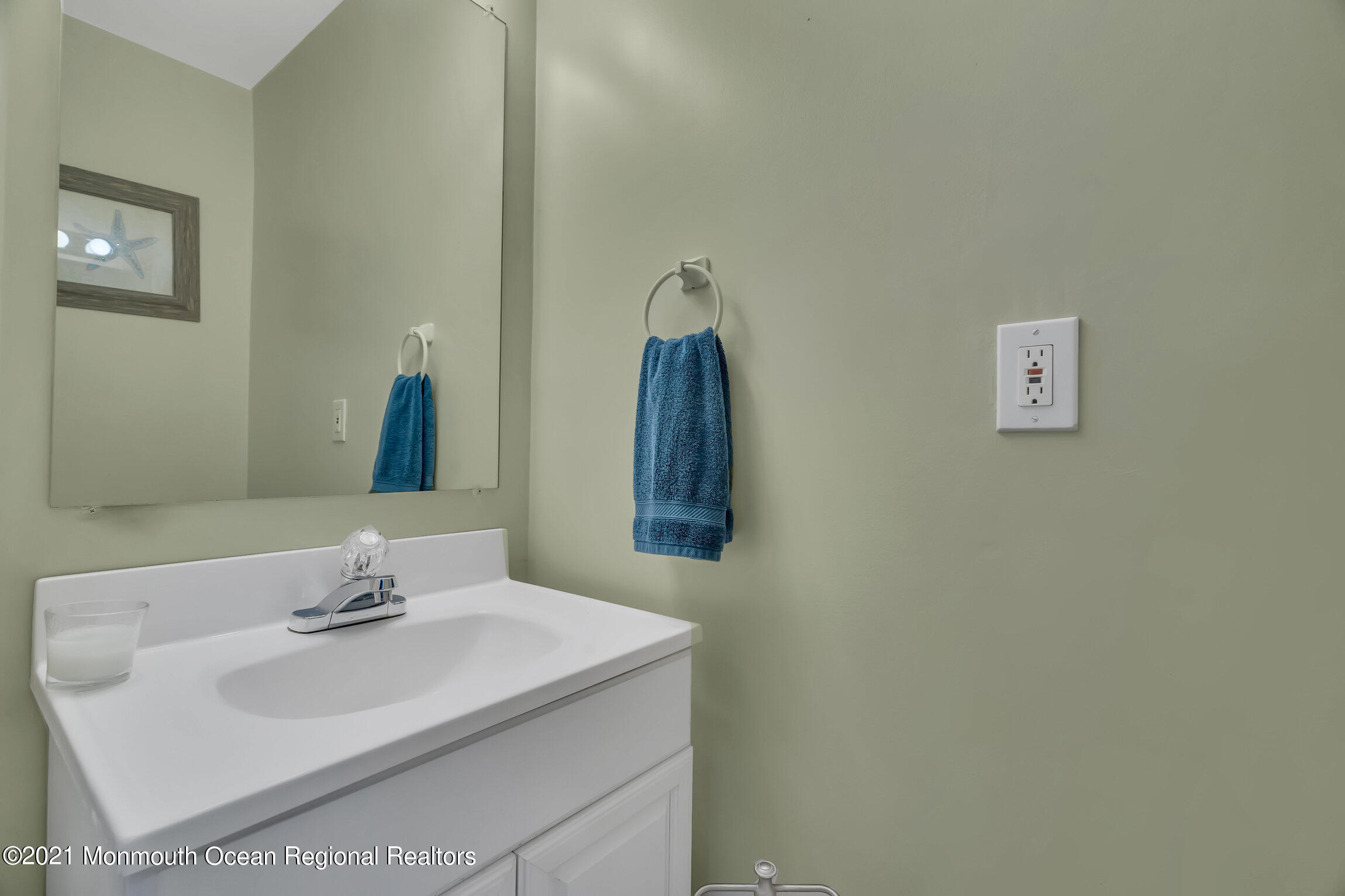 2 Coventry Road Toms River, NJ 08757 - Photo 21 of 25 a bathroom with a sink and a mirror