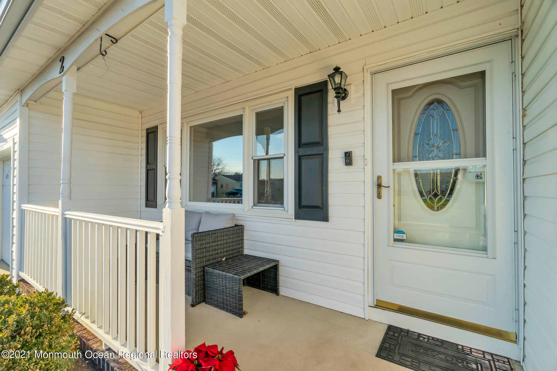2 Coventry Road Toms River, NJ 08757 - Photo 6 of 25 a front view of a house with a glass door