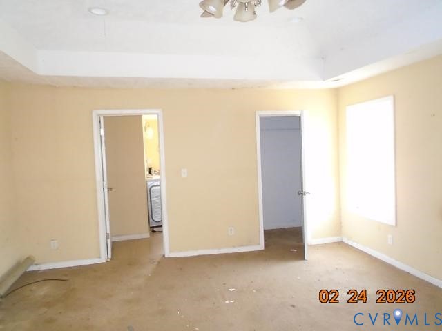 3034 Bradley Farm Road Tappahannock, VA 22560 - Photo 11 of 14 Unfurnished bedroom with baseboards and a walk in