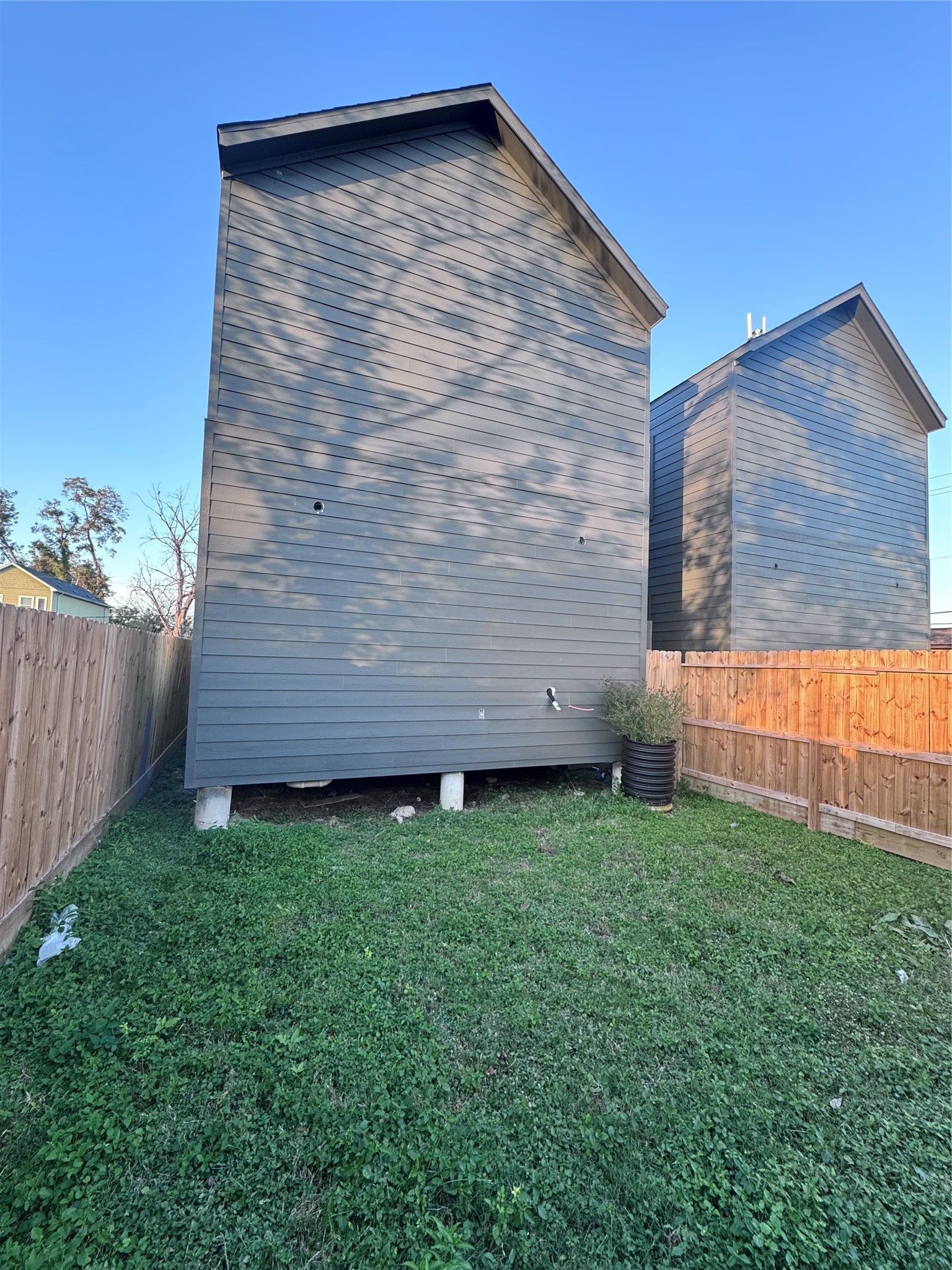 232 East 38th Street Houston, TX 77018 - Photo 8 of 8 a view of a backyard with wooden fence
