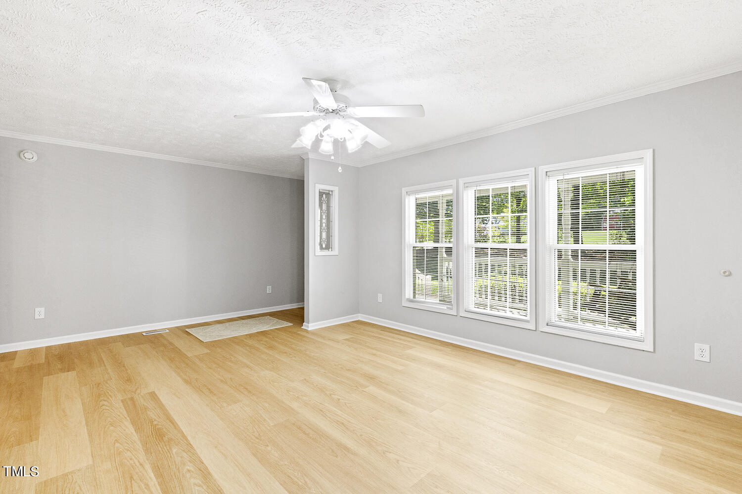 134 Rollins Mill Road Holly Springs, NC 27540 - Photo 11 of 33 a view of an empty room with a window