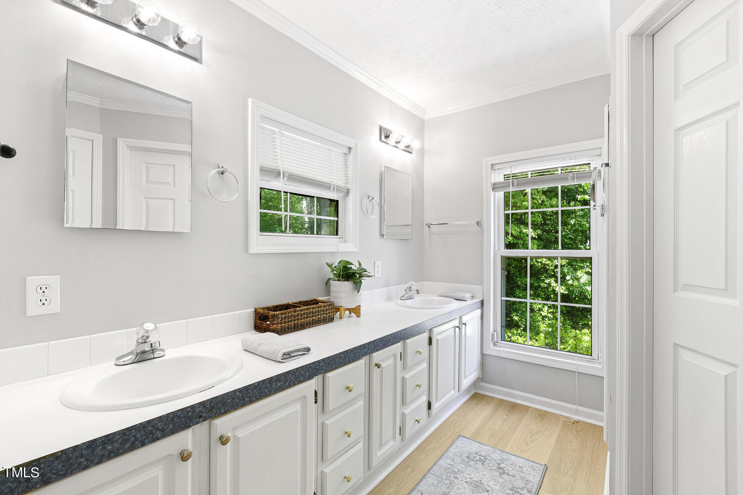 134 Rollins Mill Road Holly Springs, NC 27540 - Photo 12 of 33 a bathroom with a granite countertop sink mirror and a window