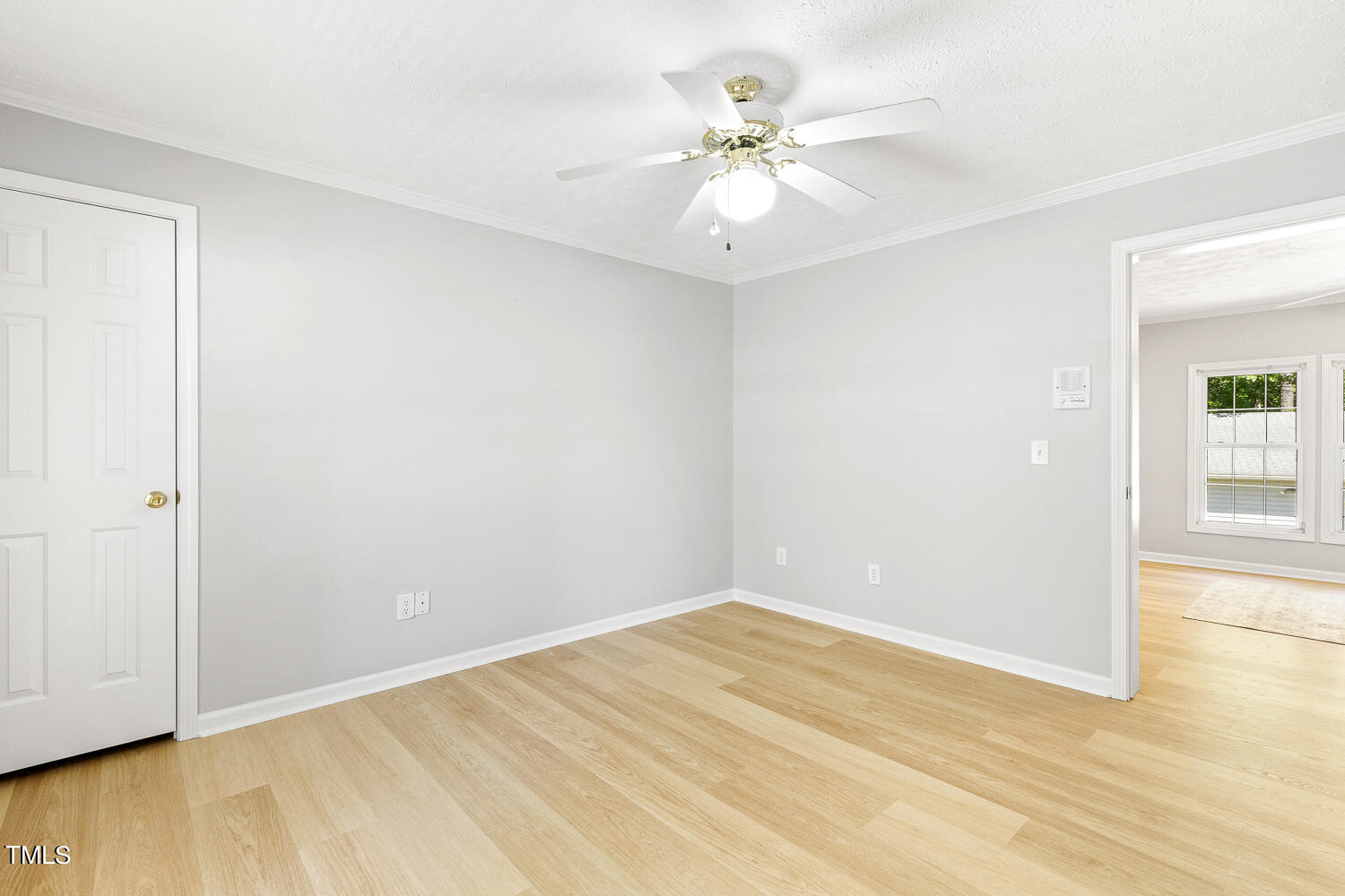 134 Rollins Mill Road Holly Springs, NC 27540 - Photo 20 of 33 a view of an empty room with wooden floor