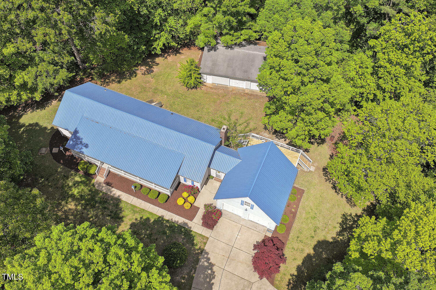 134 Rollins Mill Road Holly Springs, NC 27540 - Photo 2 of 33 an aerial view of a house with outdoor space