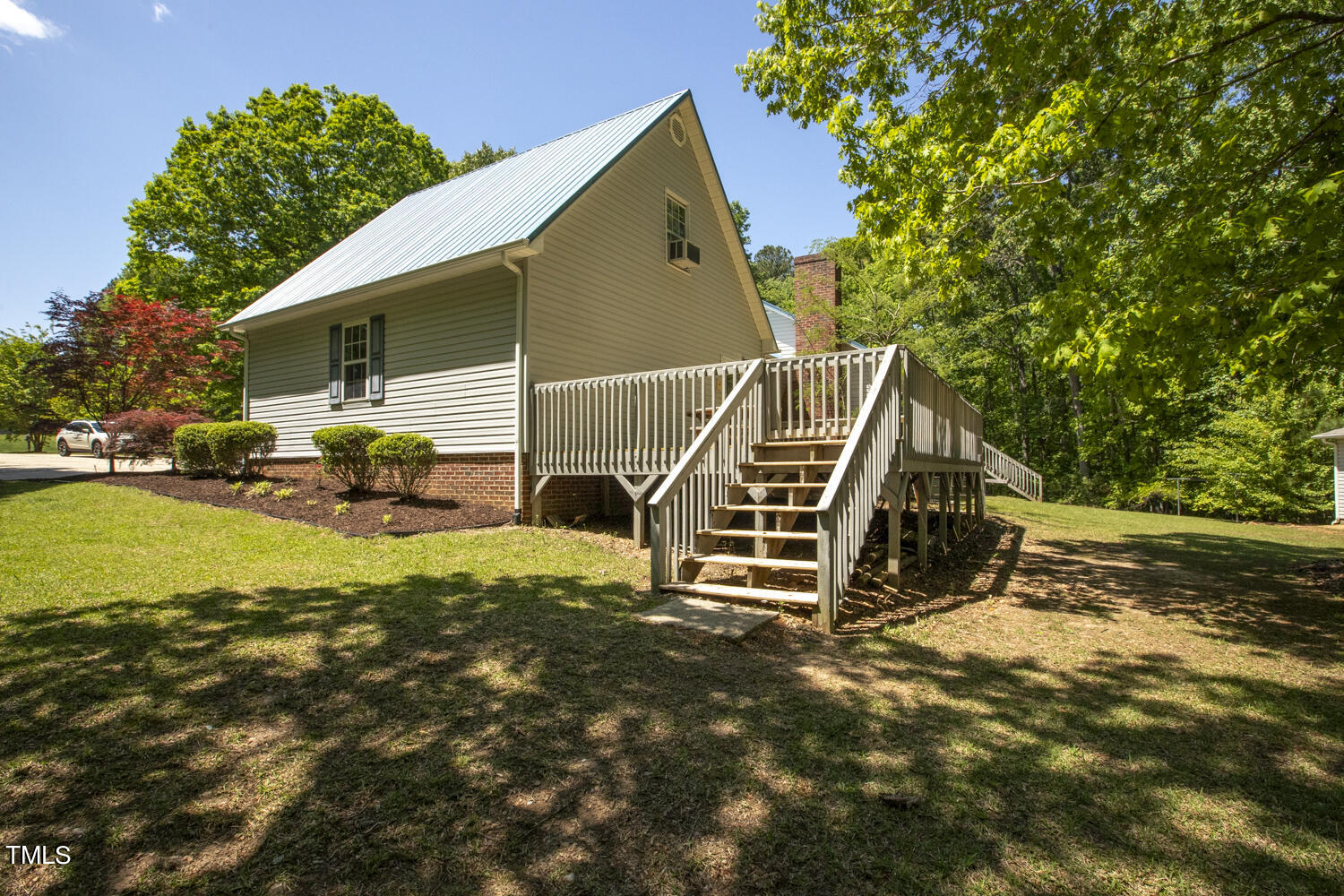 134 Rollins Mill Road Holly Springs, NC 27540 - Photo 27 of 33 a view of outdoor space and deck