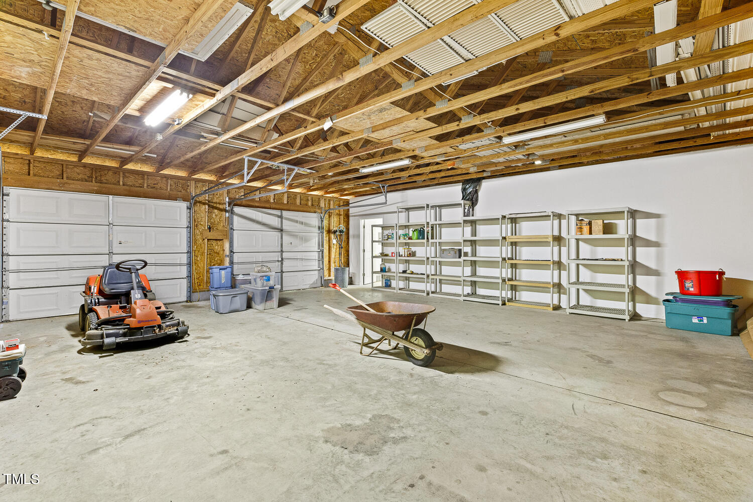 134 Rollins Mill Road Holly Springs, NC 27540 - Photo 30 of 33 a view of a room with gym equipment