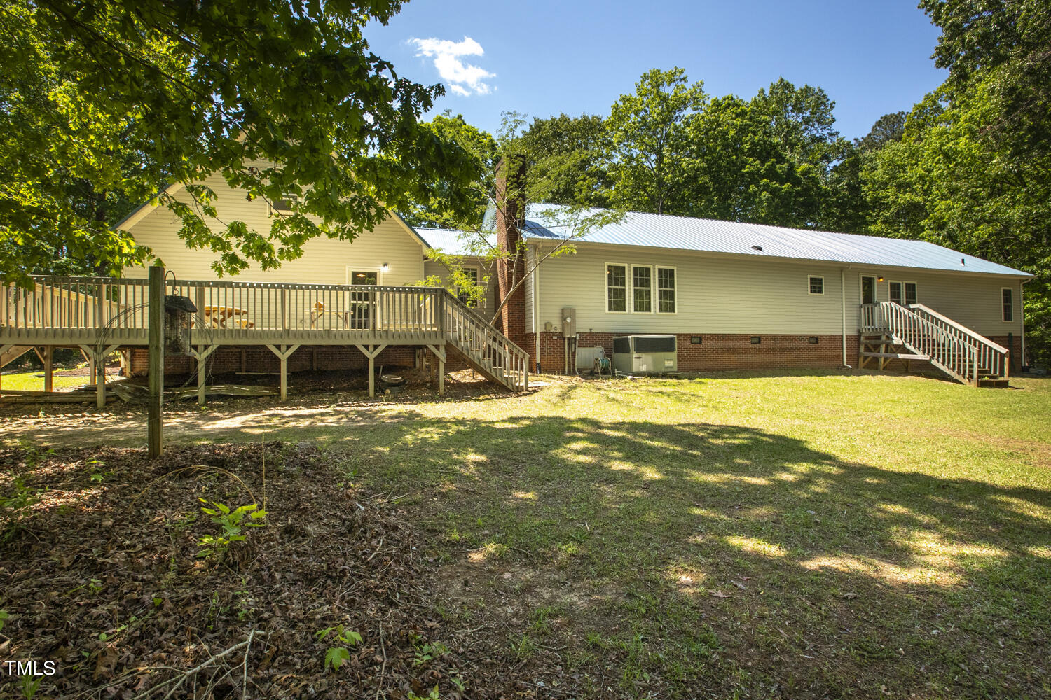 134 Rollins Mill Road Holly Springs, NC 27540 - Photo 32 of 33 a view of a house with a yard