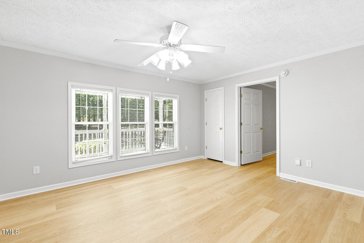 134 Rollins Mill Road Holly Springs, NC 27540 - Photo 10 of 33 a view of an empty room with a window