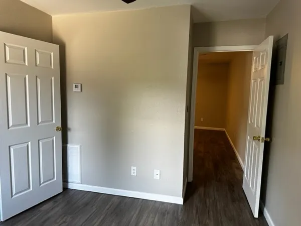 an empty room and wooden floor