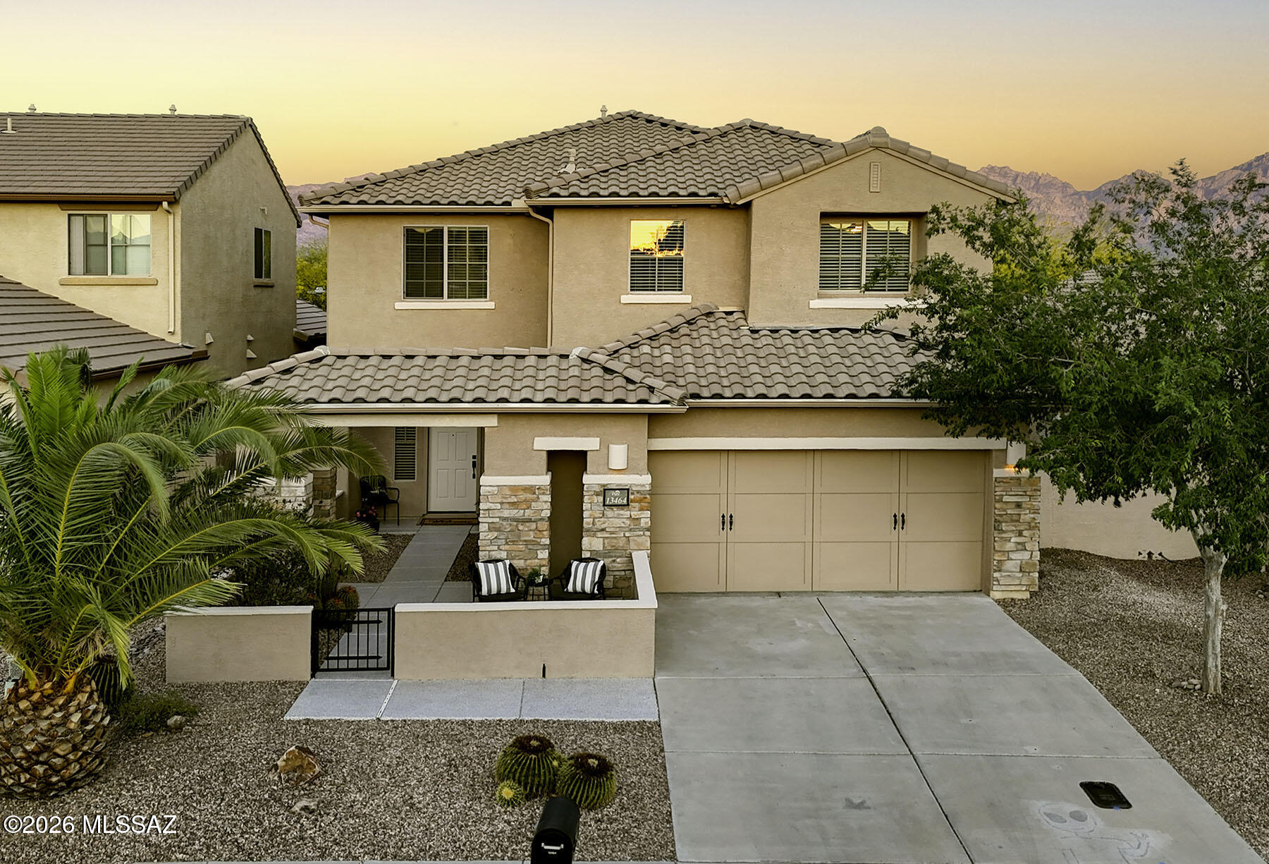 13464 North Piemonte Way Oro Valley, AZ 85755 - Photo 33 of 33 a front view of a house with a yard