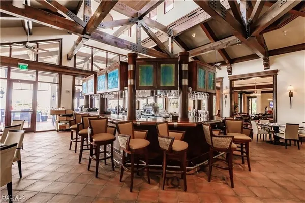 a dining room with lots of tables and chairs