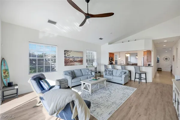 a living room with furniture and a table