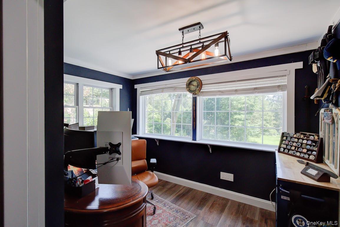 2 Spring Hollow Road Centerport, NY 11721 - Photo 19 of 49 a living room with furniture and a window
