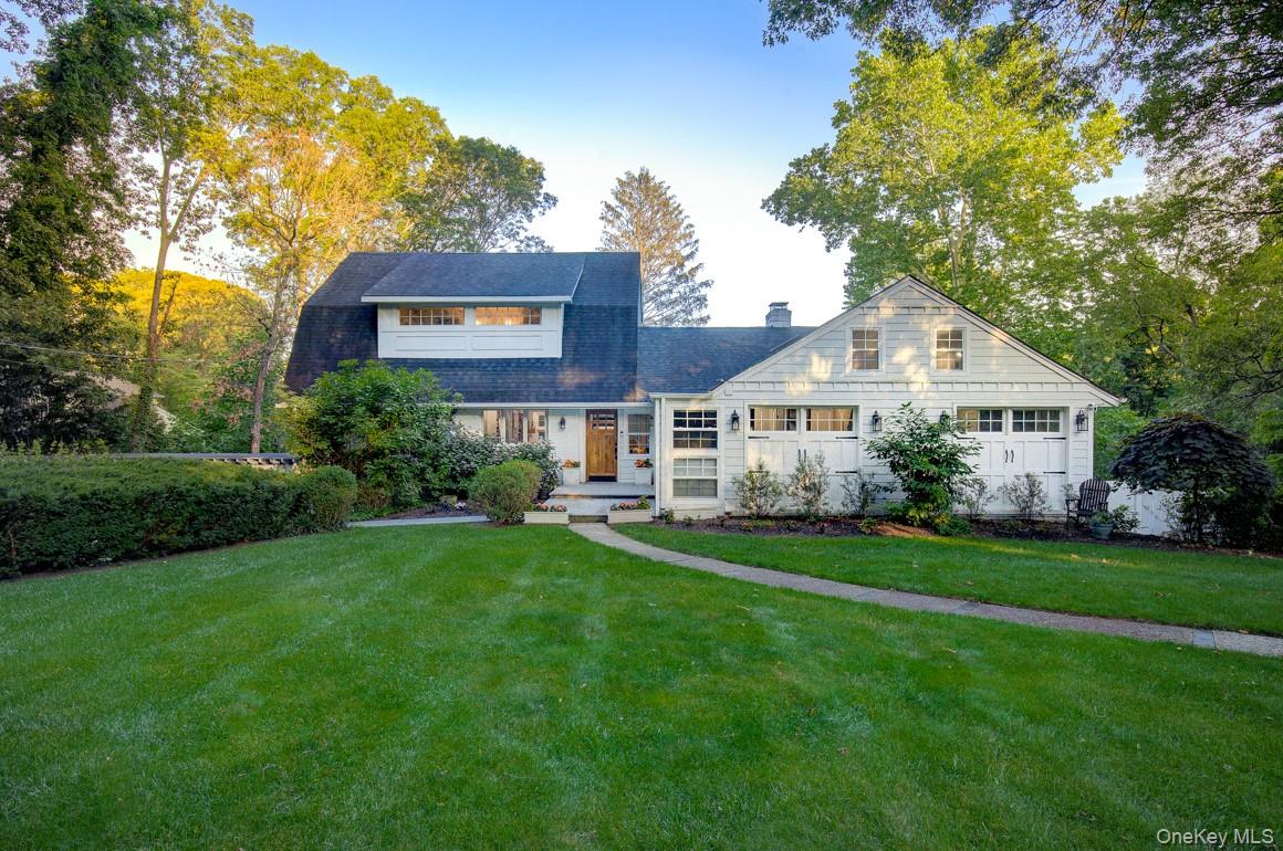 2 Spring Hollow Road Centerport, NY 11721 - Photo 2 of 49 View of front of home featuring a chimney and a front yard
