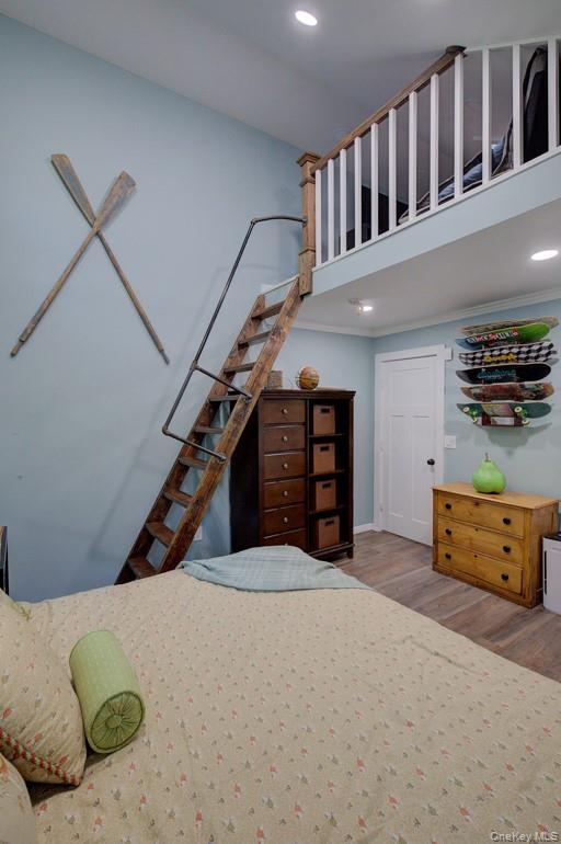 2 Spring Hollow Road Centerport, NY 11721 - Photo 22 of 49 Bedroom featuring wood finished floors and recessed lighting