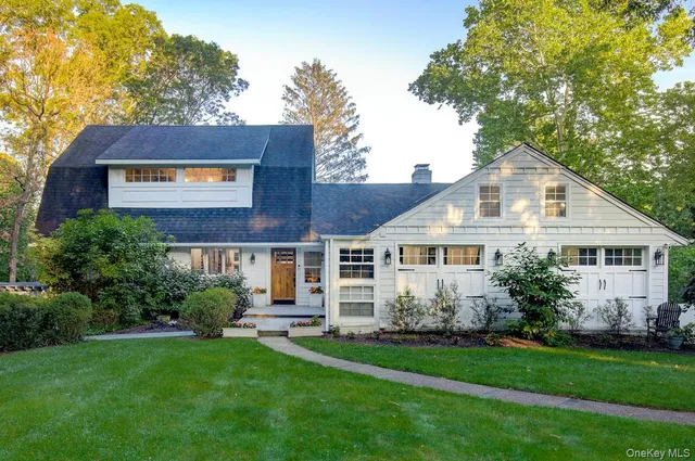 a living room with furniture fireplace and flat screen tv