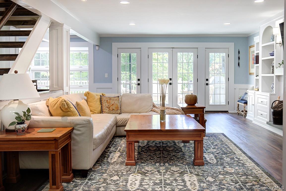 2 Spring Hollow Road Centerport, NY 11721 - Photo 7 of 49 a living room with furniture a rug and a large window