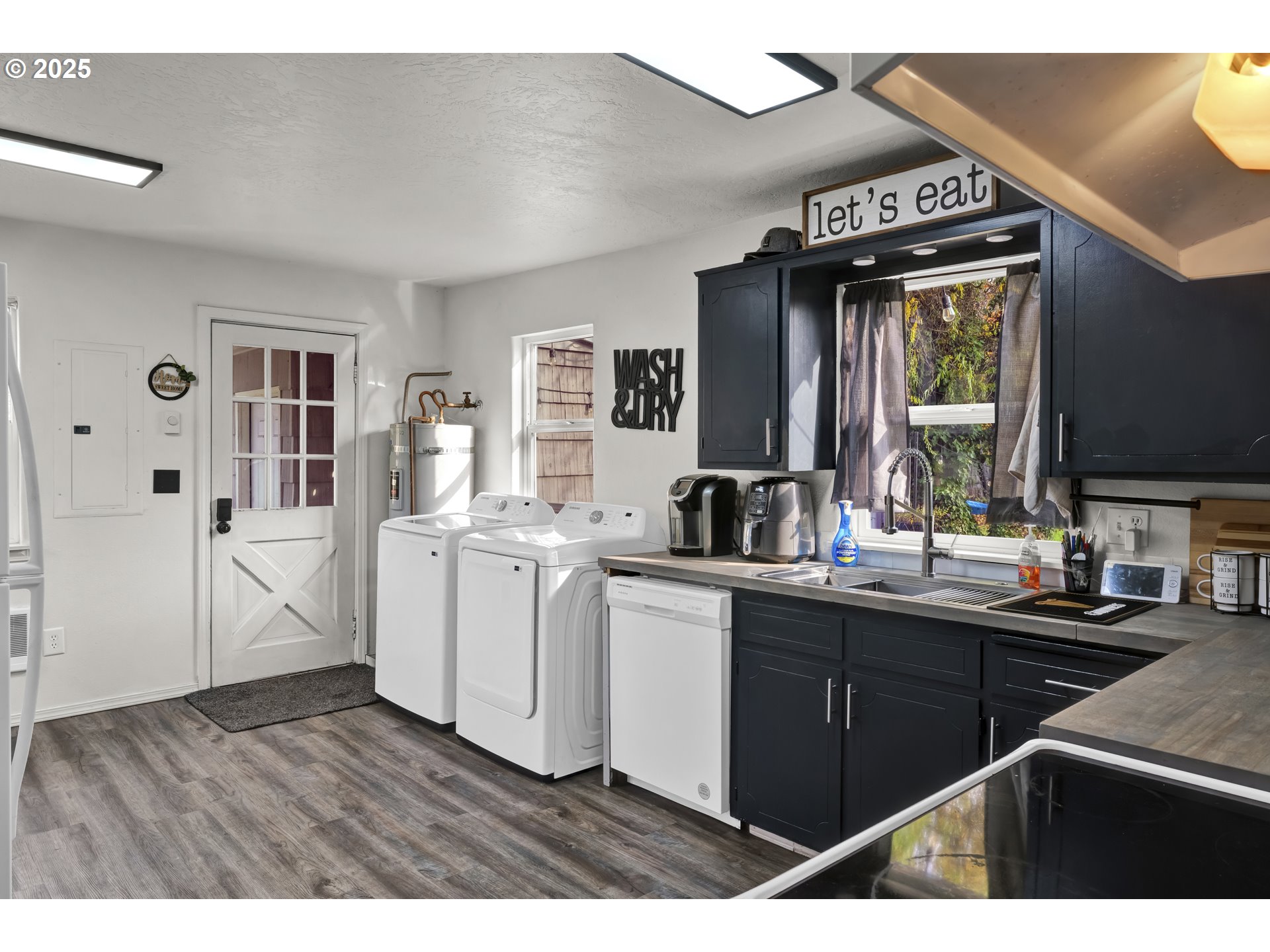 422 Elder Street Drain, OR 97435 - Photo 11 of 41 a kitchen with a sink cabinets and window