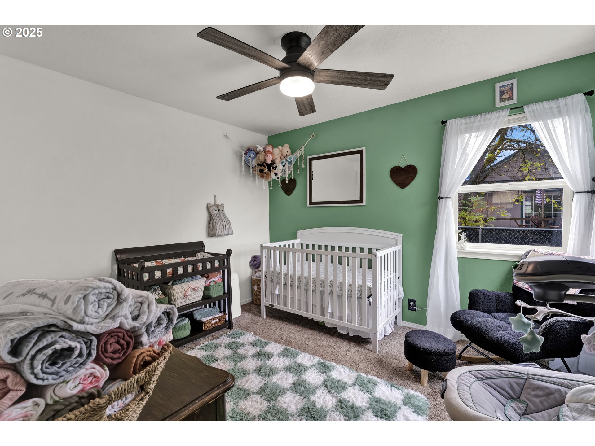 422 Elder Street Drain, OR 97435 - Photo 22 of 41 a bedroom with furniture and a large window