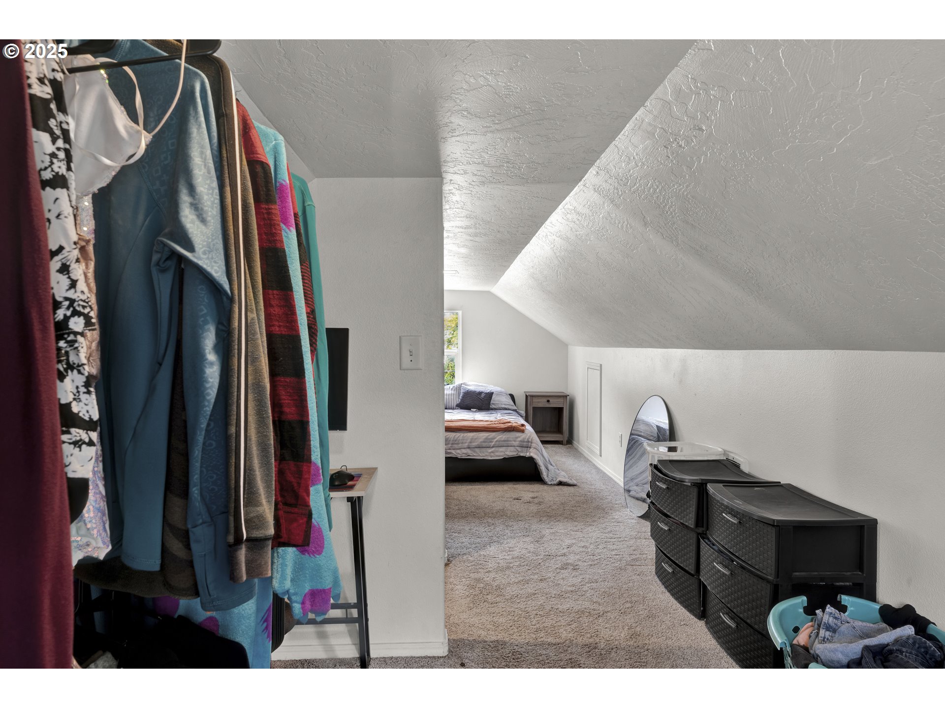 422 Elder Street Drain, OR 97435 - Photo 25 of 41 a living room with furniture and a floor to ceiling window