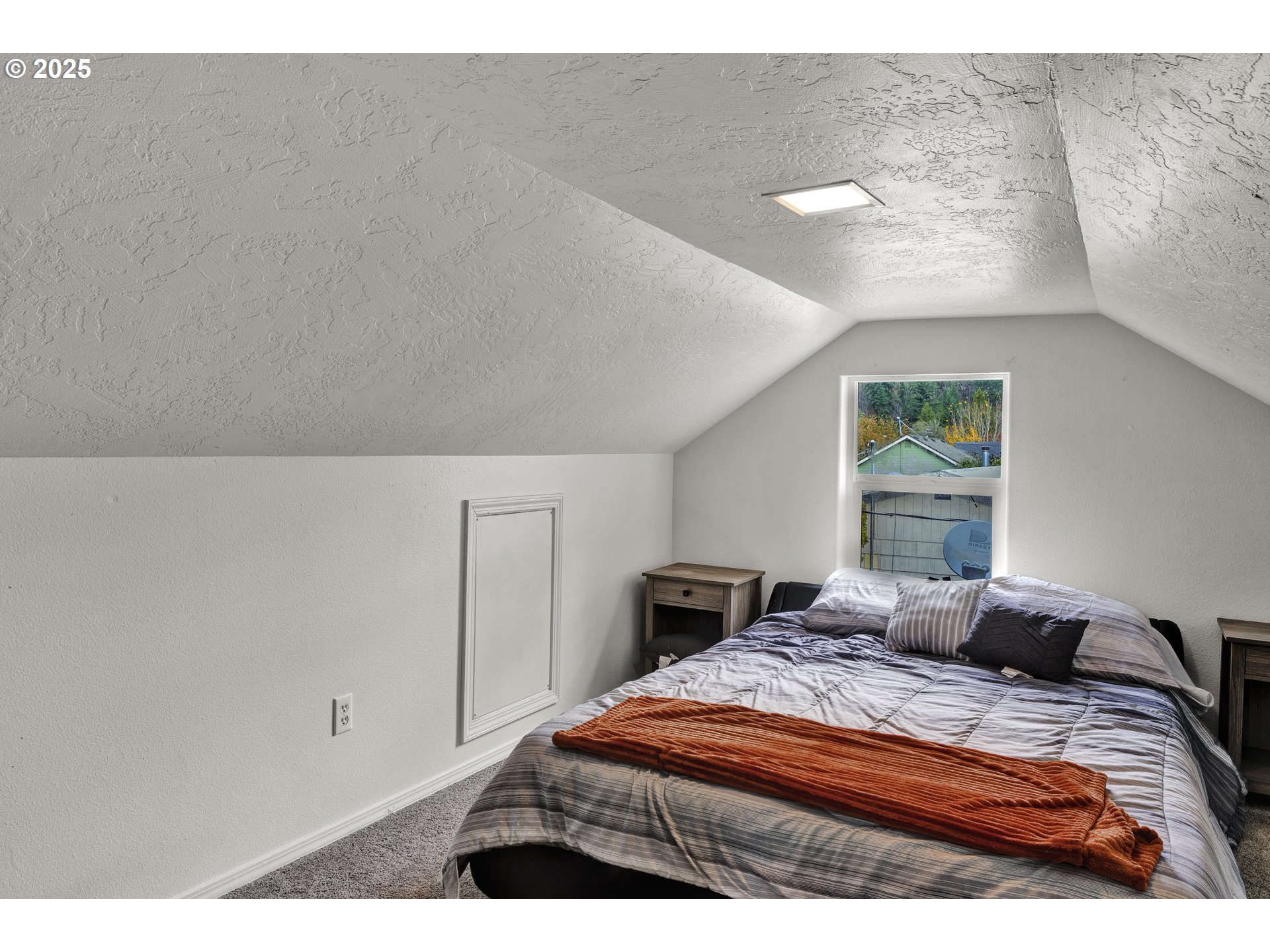 422 Elder Street Drain, OR 97435 - Photo 26 of 41 a bedroom with a bed and a window