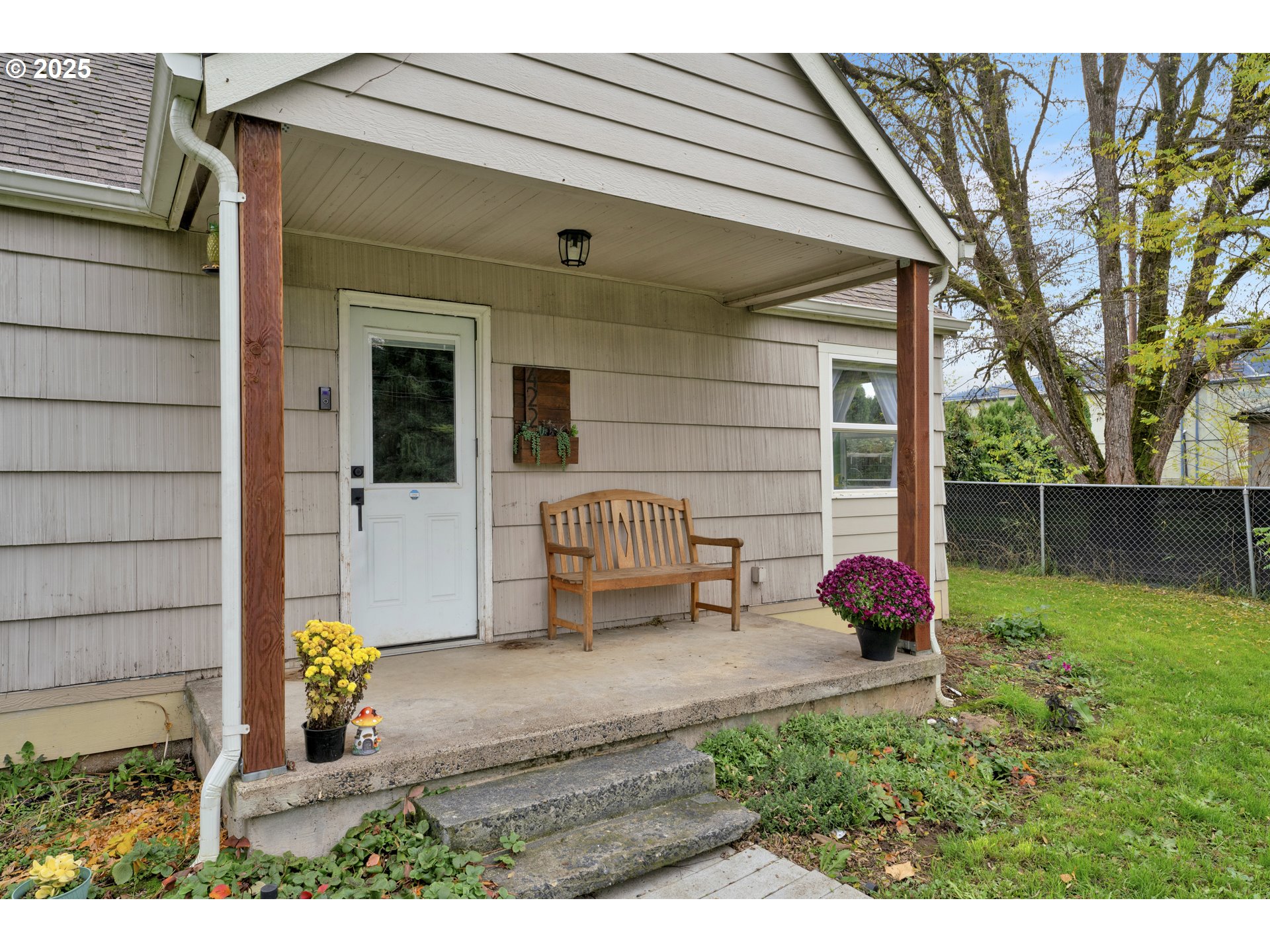 422 Elder Street Drain, OR 97435 - Photo 6 of 41 a view of backyard with barbeque grill and potted plants