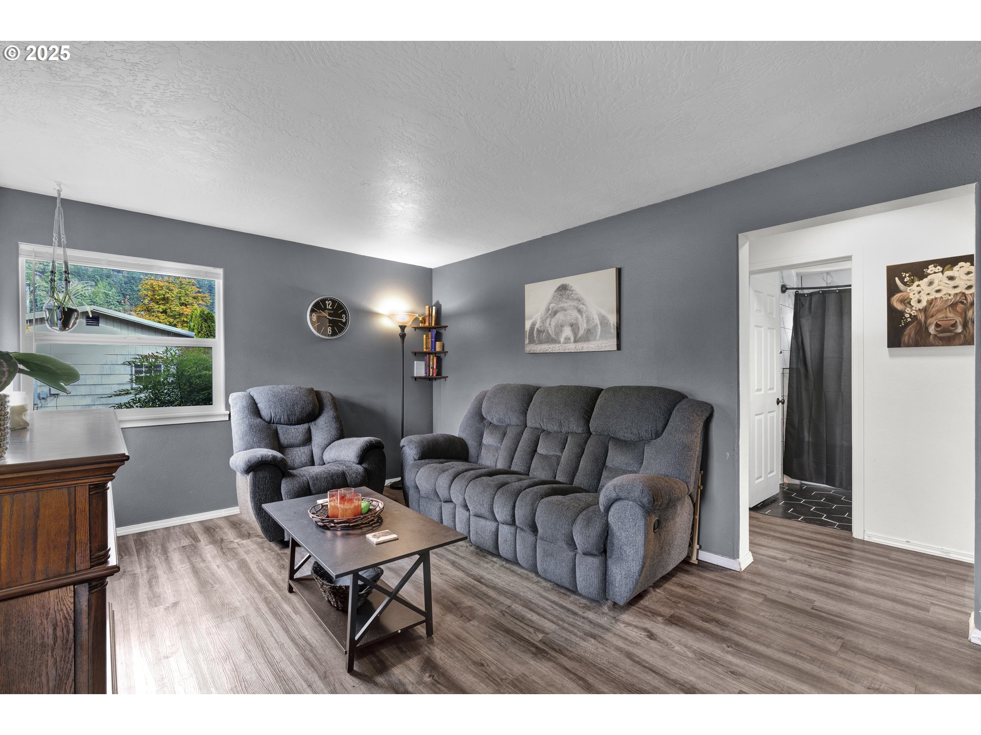 422 Elder Street Drain, OR 97435 - Photo 7 of 41 a living room with furniture and a wooden floor