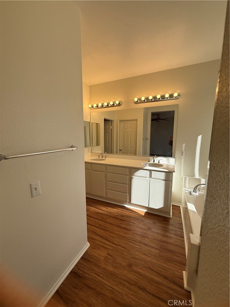 8783 Hunt Canyon Road Corona, CA 92883 - Photo 19 of 24 a room with a sink and a refrigerator