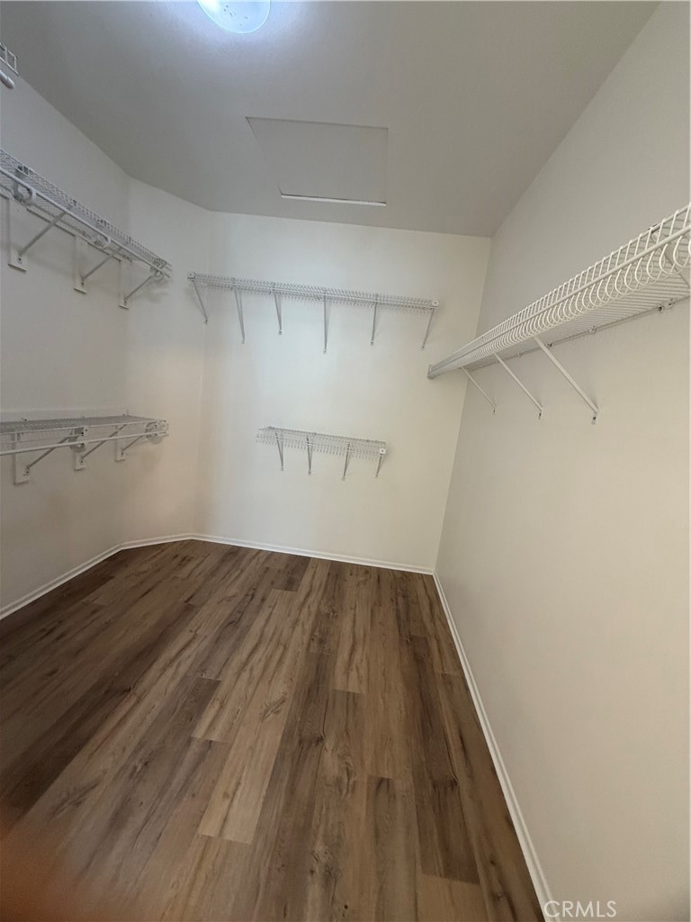 8783 Hunt Canyon Road Corona, CA 92883 - Photo 21 of 24 a view of a room with wooden floor